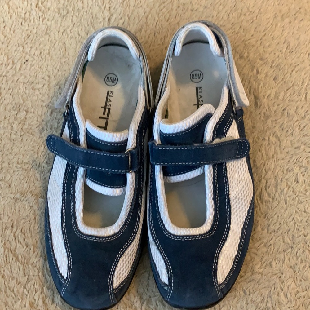 Comfy blue and white Velcro close sneakers. 8 1/2